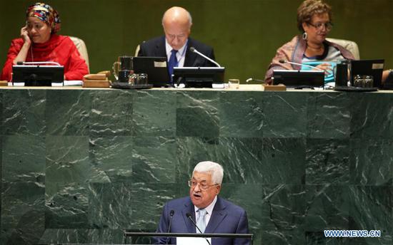 Palestinian President Mahmoud Abbas (bottom) addresses the General Debate of the 73rd session of the United Nations General Assembly at the UN headquarters in New York, on Sept. 27, 2018. (Xinhua/Qin Lang)
