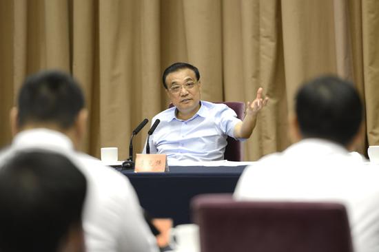 Premier Li Keqiang speaks at a symposium with entrepreneurs in Zhejiang on Sept. 28, 2018. (Photo/gov.cn)