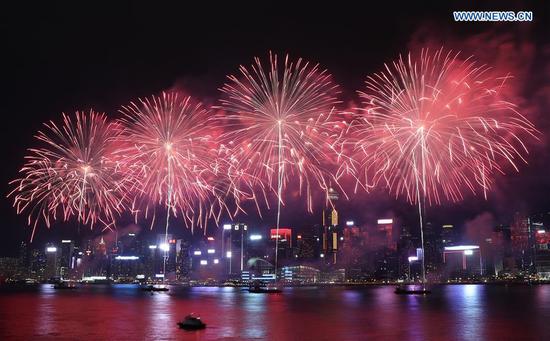 Fireworks are seen during the celebration of China's National Day, in Hong Kong, south China, Oct. 1, 2018. People celebrate the 69th anniversary of the founding of the People's Republic of China on Monday. (Xinhua/Li Gang)