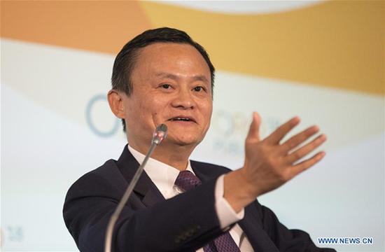 Executive Chairman of China's Alibaba Group Jack Ma speaks at the opening session of the 2018 World Trade Organization (WTO) Public Forum in Geneva, Switzerland, Oct. 2, 2018. The Director General of the World Trade Organization Roberto Azevedo and Jack Ma said Tuesday that technology should not be feared but rather harnessed to develop trade and society. (Xinhua/Xu Jinquan)
