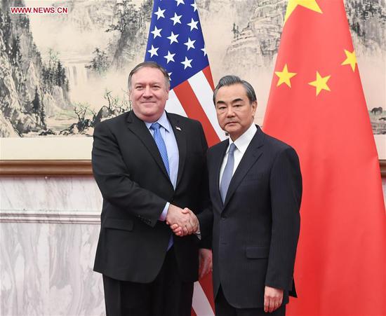 Chinese State Councilor and Foreign Minister Wang Yi (R) meets with visiting U.S. Secretary of State Mike Pompeo in Beijing, capital of China, Oct. 8, 2018. (Xinhua/Shen Hong)