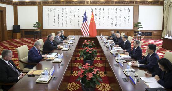 Chinese State Councilor and Foreign Minister Wang Yi holds talks with US Secretary of State Mike Pompeo in Beijing on Oct 8, 2018. (Photo by Feng Yongbin/China Daily)