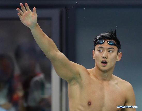 Ning Zetao of Henan reacts after the men's 100m freestyle swimming final at 13th Chinese National Games in North China's Tianjin, Sept. 4, 2017. Ning Zetao claimed the title with 47.92 seconds. (Photo/Xinhua)
