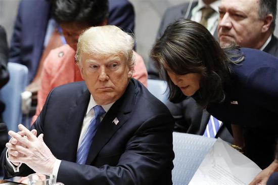 File photo shows Nikki Haley (R) tallks to U.S. President Donald Trump prior to a Security Council meeting at the UN headquarters in New York, Sept. 26, 2018. (Xinhua/Li Muzi)