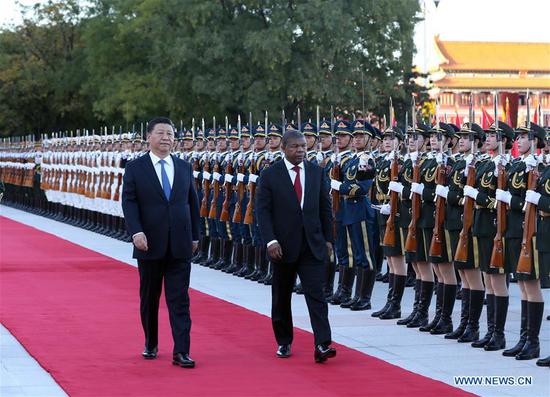 Chinese President Xi Jinping holds a welcome ceremony for Angolan President Joao Lourenco before their talks in Beijing, capital of China, Oct. 9, 2018. (Xinhua/Liu Weibing)