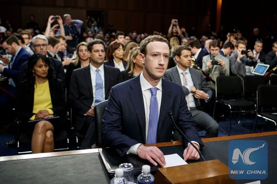 Facebook CEO Mark Zuckerberg (C) testifies at a joint hearing of the Senate Judiciary and Commerce committees on Capitol Hill in Washington D.C., United States, on April 10, 2018. (Xinhua/Ting Shen)