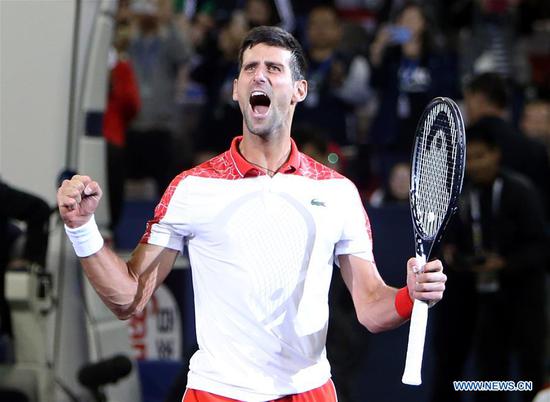 Djokovic claims title at Shanghai Masters