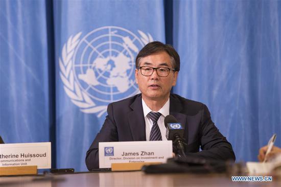 James Zhan, Director of the United Nations Conference on Trade and Development (UNCTAD)'s Investment and Enterprise Division, speaks at a press conference in Geneva, Switzerland, Oct. 15, 2018.  (Xinhua/Xu Jinquan)