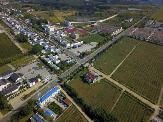 Aerial view of Xiaogang, Anhui province. The village, birthplace of China's rural reform, was at a crossroad in 1978 when the collectivized farming policy had been in force nationwide for about 20 years. (Photo by Zhu Lixin/chinadaily.com.cn)