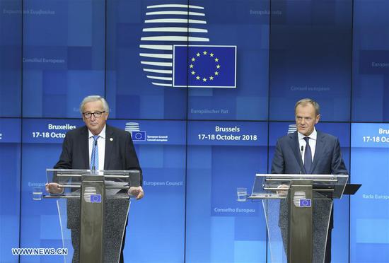 European Commission President Jean-Claude Juncker (L) and European Council President Donald Tusk attend a press conference after the EU summit on Oct. 18, 2018, in Brussels, capital of Belgium. (Xinhua/Ye Pingfan)