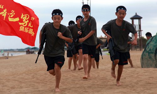 Young trainees from the Boys' Club attend an outdoor activity in Qinhuangdao during the 2018 summer camp. (Photo/Courtesy of Boys' Club)