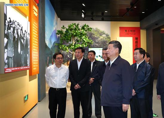 Chinese President Xi Jinping, also general secretary of the Communist Party of China Central Committee and chairman of the Central Military Commission, visits an exhibition on Guangdong's development during the past 40 years since the reform and opening up in Shenzhen, south China's Guangdong Province, during an inspection tour, Oct. 24, 2018. (Xinhua/Xie Huanchi)