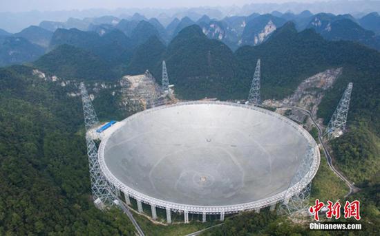 Photo taken on Sept. 15, 2016 shows the Five-hundred-meter Aperture Spherical Telescope (FAST) in Pingtang County, southwest China's Guizhou Province. (Photo/China News Service)