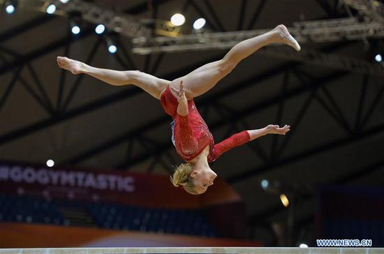 Mc Cusker Riley of the United States performs on the Balance Beam in the women's team final at the 2018 FIG Artistic Gymnastics World Championships in Doha, capital of Qatar, Oct. 30, 2018. (Xinhua/Nikku)