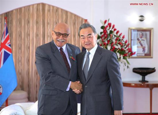 Chinese State Councilor and Foreign Minister Wang Yi (R) meets with Fijian President Jioji Konrote in Suva, Fiji, on Oct. 30, 2018. (Xinhua/Zhang Yongxing)