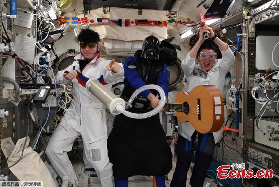 Elvis and Darth Vader invade space station for astronauts' Halloween