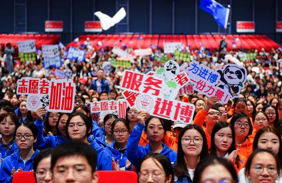 More than 5,000 volunteers prepare to take part in the China International Import Expo in Shanghai, one of the major flagship events to be held in the country this year, attracting an estimated 300,000 visitors from around the world. (Photo/Xinhua)