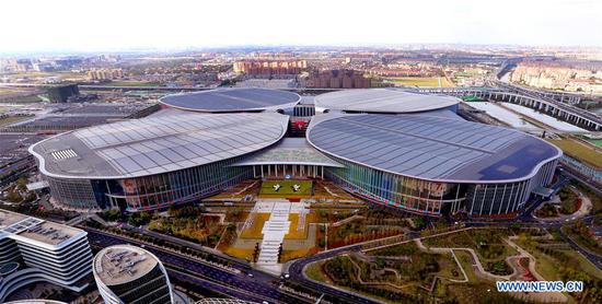 Aerial photo taken on Oct. 19, 2018 shows the National Exhibition and Convention Center (Shanghai), the main venue to held the upcoming first China International Import Expo (CIIE), scheduled to be held from Nov. 5 to 10, in Shanghai, east China. (Xinhua/Fan Jun)