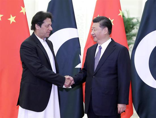 Chinese President Xi Jinping (R) meets with Pakistani Prime Minister Imran Khan at the Great Hall of the People in Beijing, capital of China, Nov. 2, 2018. (Xinhua/Ding Lin)