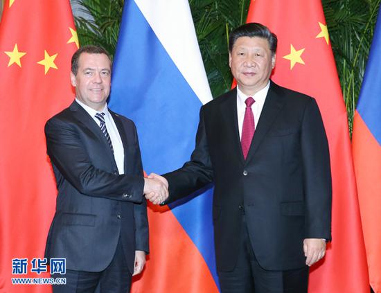 Chinese President Xi Jinping meets with Russian Prime Minister Dmitry Medvedev ahead of the first China International Import Expo in Shanghai, November 5 2018.[Photo:Xinhua]