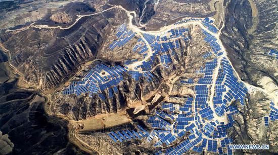 China's Suide county turns idle lands to photovoltaic power stations 