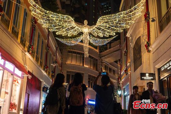 Iconic 'Spirit of Christmas' lights up Lee Tung Avenue in Hong Kong