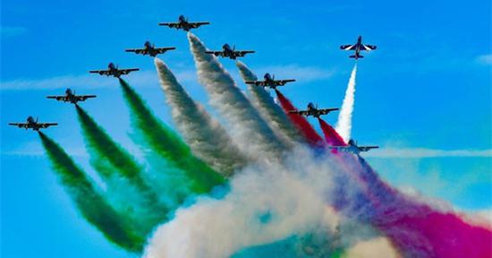 Italian Air Force aerobatic team performs over Kuwait City