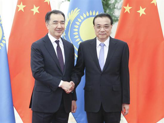 Chinese Premier Li Keqiang and his Kazakh counterpart Bakytzhan Sagintayev hold the fourth regular meeting between the Chinese premier and the Kazakh prime minister in Beijing, capital of China, Nov. 22, 2018. (Xinhua/Yao Dawei)