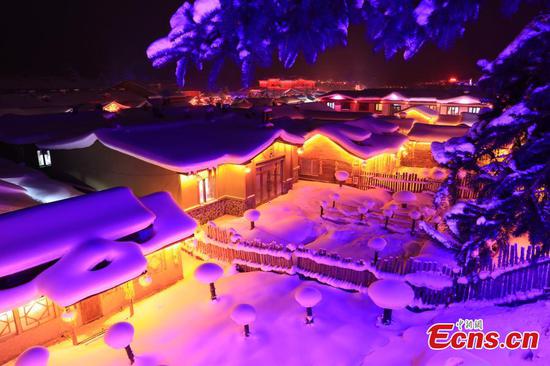 Photo taken on Dec 5, 2017 shows amazing night view of Xuexiang Village in China's northernmost province of Heilongjiang. (Photo: China News Service/Yu Kun)