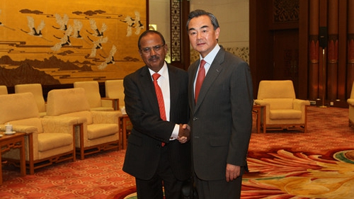 Chinese Foreign Minister Wang Yi meets with Special Envoy of Prime Minister of India and National Security Adviser Ajit Doval at the Great Hall of the People in Beijing, September 9, 2014. （Photo via Chinese Foreign Ministry）