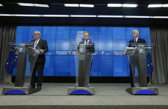 European Commission President Jean-Claude Juncker, President of the European Council Donald Tusk and the European Union's (EU) chief negotiator Michel Barnier (from L to R) attend a press conference at the end of a special Brexit summit in Brussels, Belgium, Nov. 25, 2018. (Xinhua/Ye Pingfan)