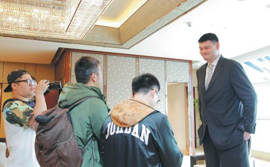 CBA chairman Yao Ming addresses media after announcing Caterpillar as a new sponsor of the domestic league. (HU CHENGWEI/FOR CHINA DAILY)