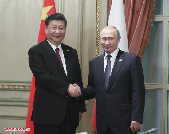 Chinese President Xi Jinping (L) meets with his Russian counterpart Vladimir Putin, in Buenos Aires, Argentina, Nov. 30, 2018. (Xinhua/Xie Huanchi) 