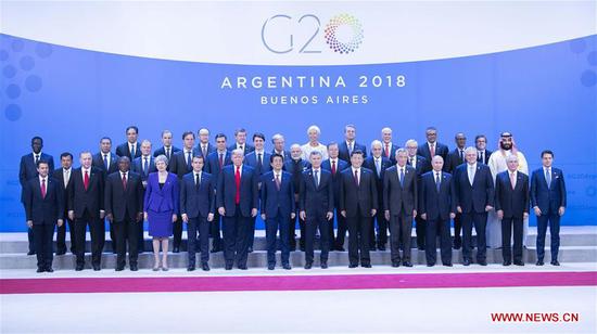 Chinese President Xi Jinping (6th R, front) poses for a group photo with other leaders attending the 13th summit of the Group of 20 (G20) in Buenos Aires, Argentina, Nov. 30, 2018. The 13th G20 summit is held here on Friday. Xi Jinping delivered a speech titled 