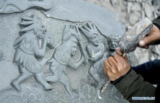 Residents turn plain rocks into delicate artworks