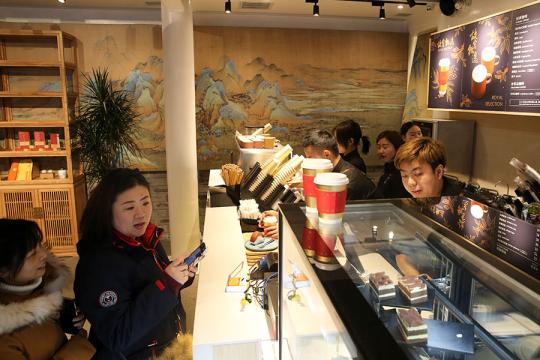 Customers line up at the newly opened Corner Tower Cafe at the Palace Museum in Beijing, Dec. 5, 2018. (Photo by Feng Yongbin/China Daily)
