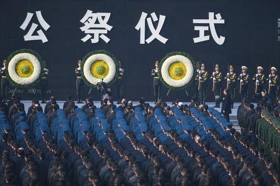 Photo taken on Dec 13, 2018 shows the scene of the state memorial ceremony for China's National Memorial Day for Nanjing Massacre Victims at the memorial hall for the massacre victims in Nanjing, East China's Jiangsu province. [Photo/Xinhua]