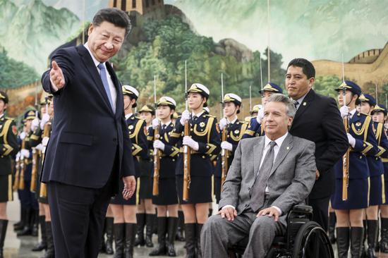 President Xi Jinping hosts Ecuadorian President Lenin Moreno during a welcoming ceremony at the Great Hall of the People in Beijing on Wednesday. Moreno began a three-day visit to China on Tuesday. [Photo by Wu Zhiyi/China Daily] 