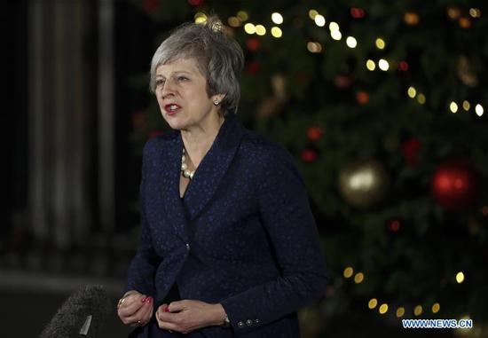 British Prime Minister Theresa May makes a statement after winning the confidence vote outside 10 Downing Street in London, Britain, on Dec. 12, 2018. Theresa May on Wednesday won by a large margin a confidence vote by her fellow Conservative members of parliament. (Xinhua/Han Yan)