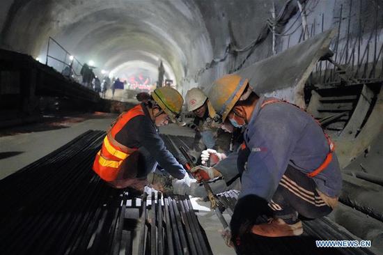 New Badaling tunnel of Beijing-Zhangjiakou high-speed rail line cut through