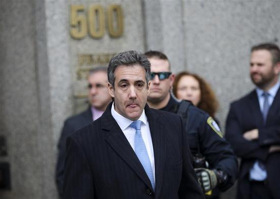 Michael Cohen (C) walks out of a court building in New York, the United States, Dec. 12, 2018. Michael Cohen, U.S. President Donald Trump's former long-term personal attorney, was sentenced to three years in jail on Wednesday after pleading guilty to a series of crimes, including campaign finance violations, tax evasion and lying to Congress. (Xinhua/Wang Ying)