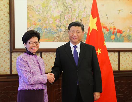 Chinese President Xi Jinping (R) meets with Chief Executive of Hong Kong Special Administrative Region (HKSAR) Carrie Lam, who is on a duty visit, in Beijing, capital of China, Dec. 17, 2018. (Xinhua/Xie Huanchi)
