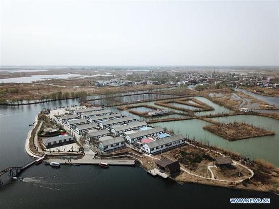 Aerial photo taken on March 29, 2018 shows the Wangyuedao Island in the Baiyangdian Lake in Xiongan New Area, north China's Hebei Province. /Xinhua Photo