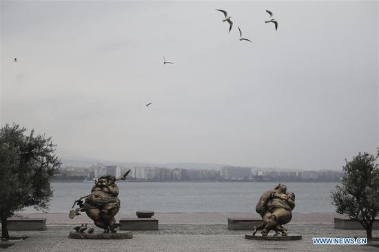 Sculptures by Chinese artist Xu Hongfei are seen in an open-air show at the port city of Thessaloniki, Greece, December 18, 2018. /Xinhua Photo