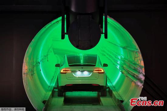 Elon Musk unveils underground tunnel