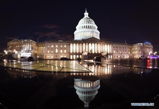 The U.S. Capitol is seen in Washington D.C., the United States, on Dec. 21, 2018. A partial shutdown of the U.S. federal government came into effect, starting Friday midnight, after failed attempts to end a budget impasse over President Donald Trump's long-promised border wall. (Xinhua/Liu Jie)
