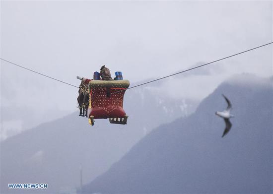 Flying Santa Claus stunt show held by Christmas market in Montreux, Switzerland