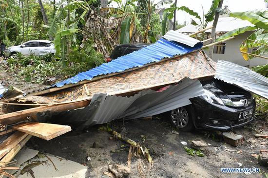 Tsunami triggered by volcano kills hundreds in Indonesia