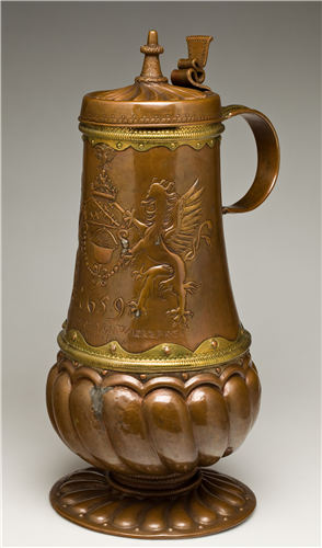 Polish cultural relics on show in the Capital Museum include a copper wine pot. (Photo provided to China Daily)