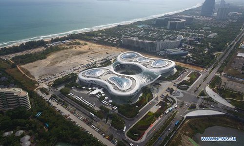 Photo taken on Dec. 1, 2018 by a drone shows an international duty free mall in Sanya, south China's Hainan Province. China's Hainan Province raised its annual tax-free shopping quota to 30,000 yuan (about 4,300 U.S. dollars) per year from the current 16,000 yuan for travelers, without limit on the number of purchases, according to a joint statement from the Ministry of Finance (MOF) and China's customs and taxation authorities. (Xinhua/Yang Gaunyu)